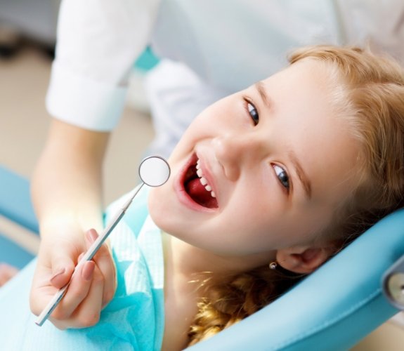Young girl smiling at a dental checkup with childrens dentist in South Elgin