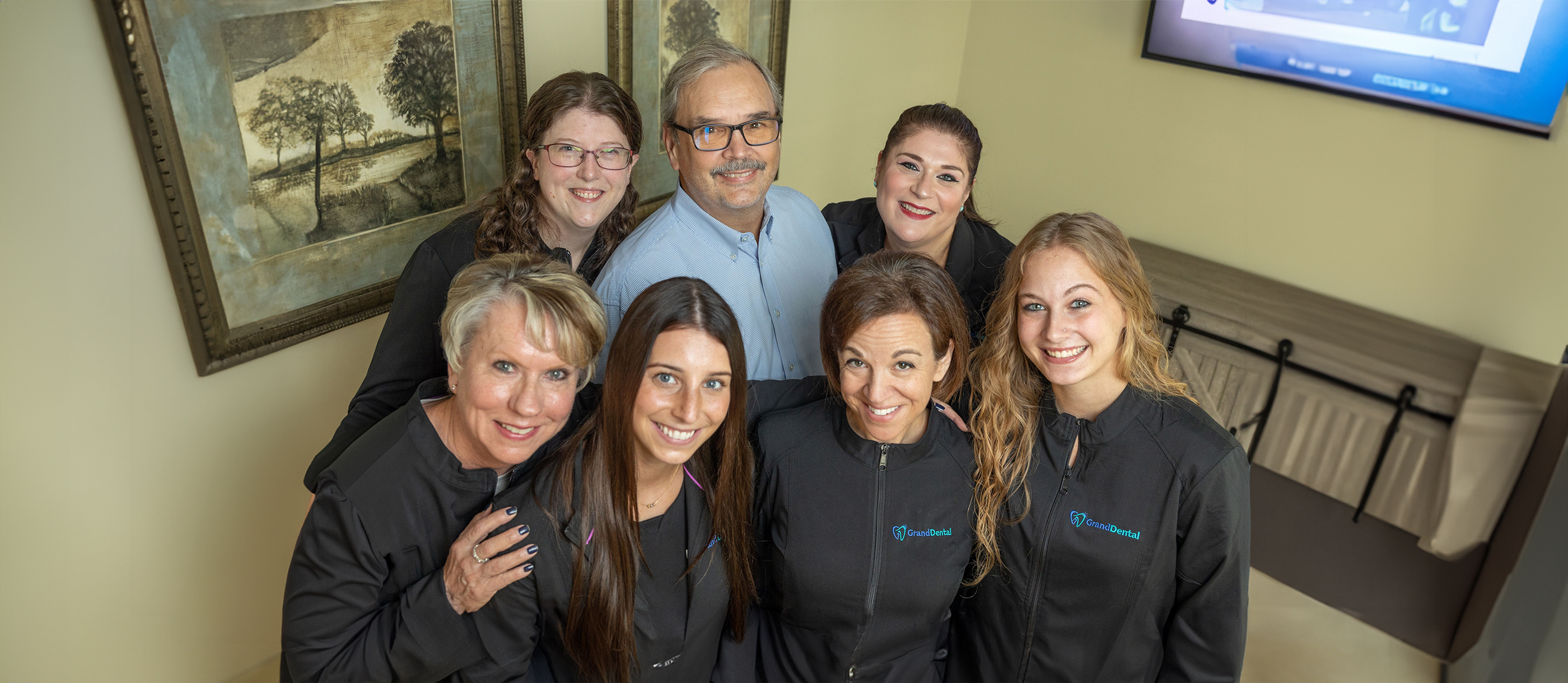 Smiling South Elgin Illinois dentist and team members at Grand Dental South Elgin