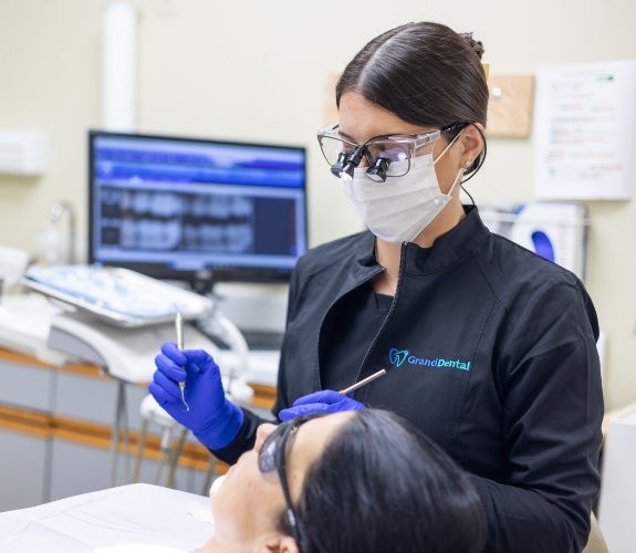 Dental team member giving a patient a preventive dentistry checkup in South Elgin