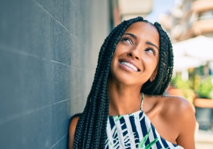 Woman smiling and looking up