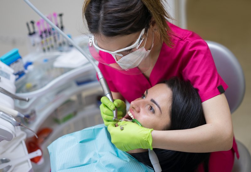 dental patient having her teeth cleaned